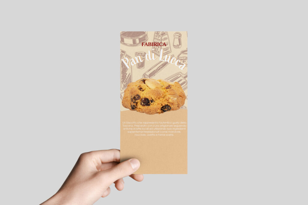 Kraft DL Flyer Mock-Up - Male hands holding a kraft flyer on a gray background.